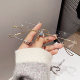 High quality fashion ins style rimless glasses anti blue light metal frame women glasses
